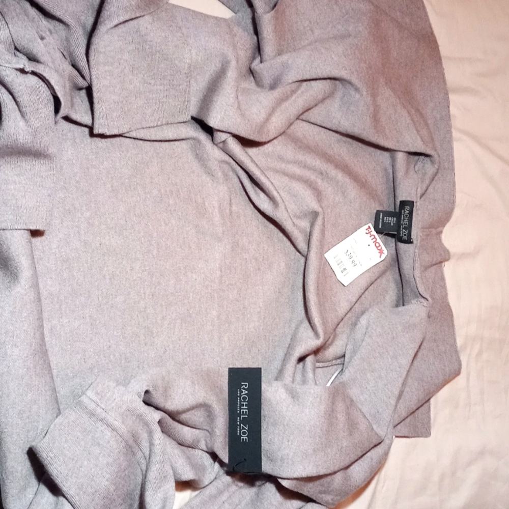 This is a brand new grey, long sleeve sweater from Rachel Zoe.